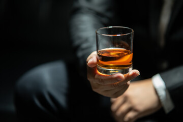 Businessmen in suits drinking  Celebrate whiskey.