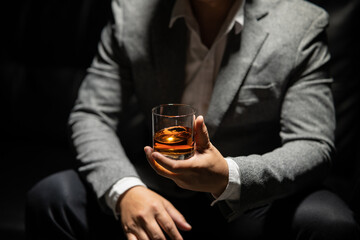 Businessmen in suits drinking  Celebrate whiskey.