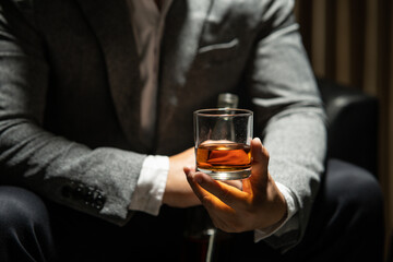 Businessmen in suits drinking  Celebrate whiskey.
