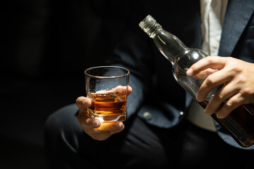 Businessmen in suits drinking  Celebrate whiskey.