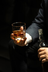 Businessmen in suits drinking  Celebrate whiskey.