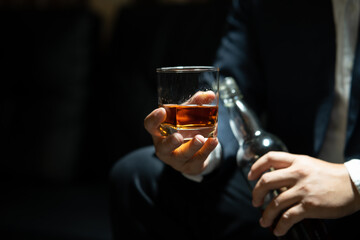 Barman pouring whiskey whiskey glass beautiful night