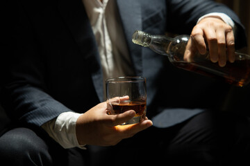 Businessmen in suits drinking  Celebrate whiskey.