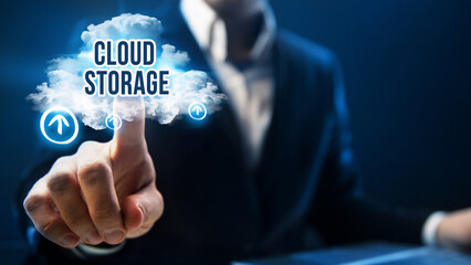 Cloud storage concept. Businessman uses cloud storage technology.