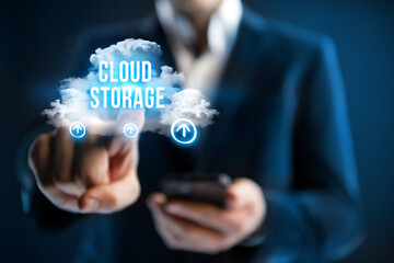 Cloud storage concept. Businessman uses cloud storage technology.