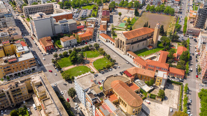 Fototapeta na wymiar Aerial view of Latina Cathedral. The church is dedicated to Saint Mark and located in the centre of the city of Latina, Lazio, Italy. The Duomo of San Marco is a Roman Catholic cathedral.