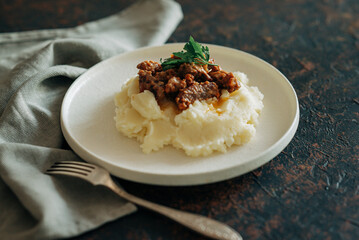 Tasty mashed potato with beef stroganoff hot dishes in lifestyle rustic style beautiful food image