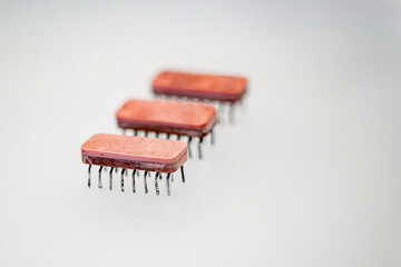 An old-style microcircuit soldered from the board.