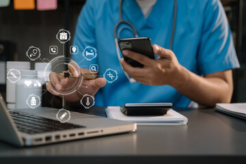 Doctor working with a tablet and smartphone search for medical information at the hospital office during the day.