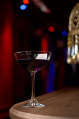 Classic cocktail glass table in night club restaurant