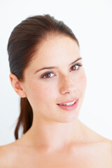 Obraz premium Beauty, portrait and woman in studio for skincare, grooming and natural cosmetics on white background. Face, skin and wellness girl model relax after treatment and pamper, isolated or mockup