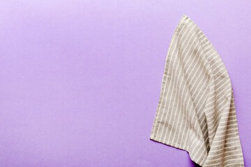 top view with gray kitchen napkin isolated on table background. Folded cloth for mockup with copy space, Flat lay. Minimal style