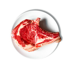 Beef prime rib on a plate isolated on white