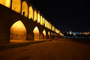 Fotobehang Khaju Brug Khaju Bridge in Isfahan lit up at dusk in Iran