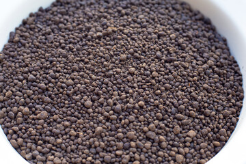 Fertilizer, chicken manure pellets. Natural plant food