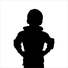 silhouette of a child with hands on waist