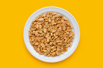Peanut on yellow background. Top view