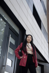 Young Chinese woman dressed as a businesswoman