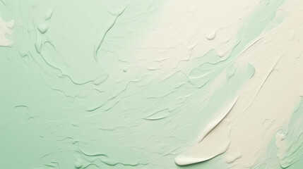 cream texture in pastel green and turkis colors, top view