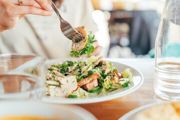 Close up of female enjoying a healthy meal for lunch