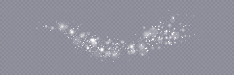 Particles of white magic dust. Shining light particles.Christmas glitter particles. Light effect on a transparent background