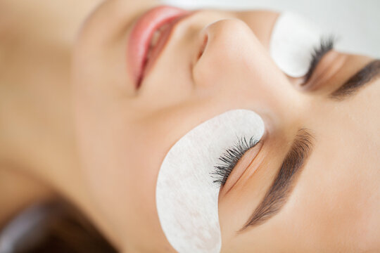 Beautiful Woman with long eyelashes in a beauty salon.