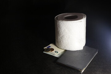 roll of toilet paper on black