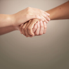 Empathy, support and help with people holding hands in comfort, care or to console each other....