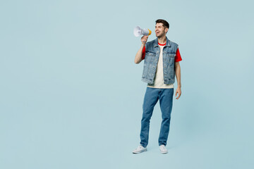 Full body young man wears denim vest red t-shirt casual clothes hold megaphone scream announces...