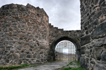 View of Loriberd fortres gates on cloudy autumn day. Lori Province, Armenia.