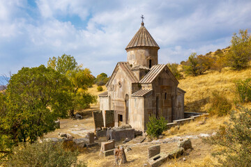 Fototapeta na wymiar Surb Hovannes church of Tsakhats Kar monastery on sunny autumn day. Vayots Dzor Province, Armenia.
