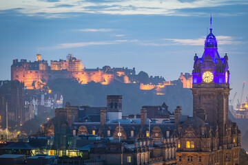 Edinburgh scenic skyline at sunset, wide panoramic view from Calton Hill. Cityscape of Edinburgh during blue hour