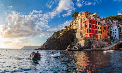 Riomaggiore in Cinque Terre, Italy at sunset - obrazy, fototapety, plakaty