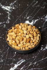 Dried mulberry. Sun-dried organic white dried mulberry in bowl. Superfood, Vegetarian food concept. healthy snacks