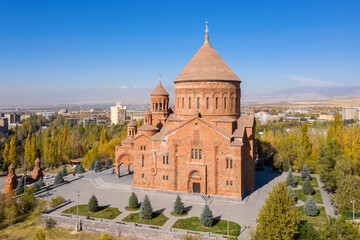 Fototapeta na wymiar Drone view of Saint John Church on sunny autumn day. Abovyan town, Kotayk Province, Armenia.