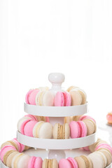 colorful macaroons on wooden background