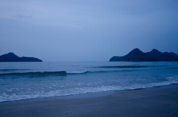 Beautiful blue sky and sea with mountains in early morning