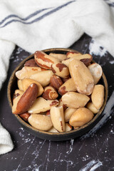 Brazil nut. Brazil nut in wooden bowl. Superfood. Vegetarian food concept. healthy snacks
