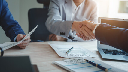 Shaking hands, Business lawyer team. Working together judge counselor having team meeting with client discussing legal legislation at law firm, Law and Legal services concept.