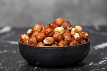Hazelnut. Peeled hazelnuts in bowl. Superfood. Vegetarian food concept. Healthy snacks