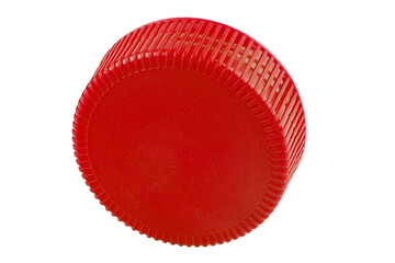 Plastic bottle caps of red color isolated against a white background.