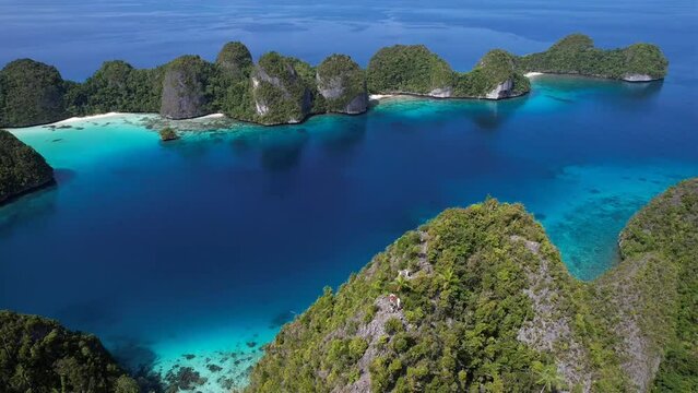 Incredible view on lagoons and trekking view point, white sand beaches, paradise islands and reefs in Raja Ampat, Indonesia, Lost Paradise.