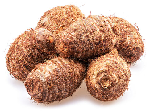 Eddoe or taro tubers isolated on white background.