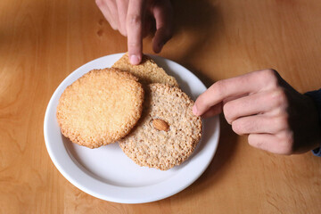 hands holding cookies
