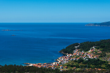 Naklejka premium View of the town of O Pindo, and bridge of Ezaro. Galicia. Spain.