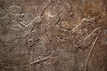 Sumerian wall relief, ancient cuneiform Sumerian text. Historical background on the theme of...