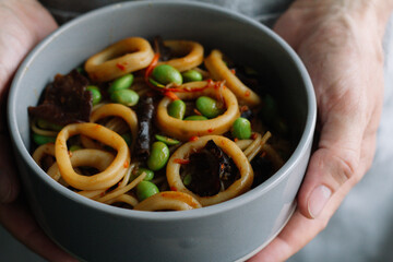 noodles with seafood and vegetables close-up

