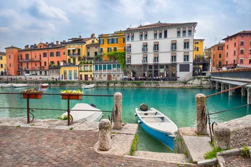 Fotobehang Peschiera del Garda, Italy - small historic fortified town located on lake Garda © bbsferrari