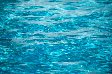 Blue ripped water in swimming pool, water pool texture and surface water backgraund.
