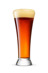 Pilsner glass of fresh dark brown beer with cap of foam isolated. Transparent PNG image